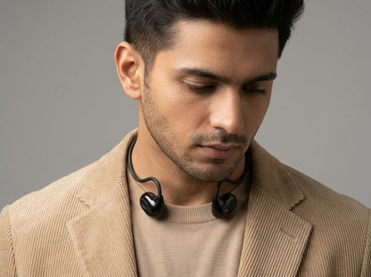 User wearing CTRL8 VV4 Air Bone Conduction Neckband for hands-free calls and music playback